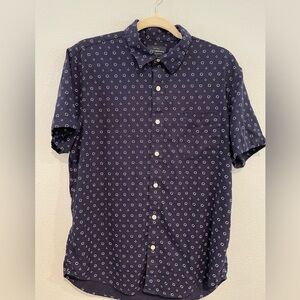 Men’s Lucky Brand Navy blue button down shirt with white novelty print. …